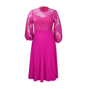 Detail of fuchsia lace hollow-out crochet pattern and elegant pleated skirt texture