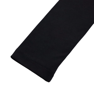 Detailed close-up showing precise stitching and mesh splicing on black long sleeve dress