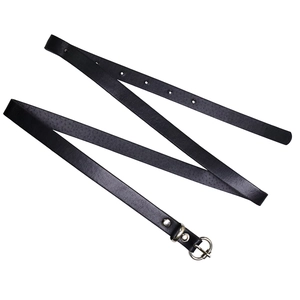 Close-up of slim black leather belt with a minimalist silver circular metal buckle detail