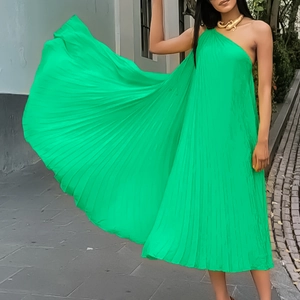 Elegant bright green one-shoulder pleated maxi dress with a flowing large swing silhouette