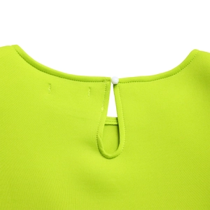 Detail of neon green round neck with keyhole back and pearl button on dress