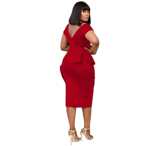 Detailed back view of red midi dress with V-neckline and elegant peplum waist detail