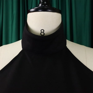 Detail of black high-neck sleeveless top with fine texture on a professional mannequin