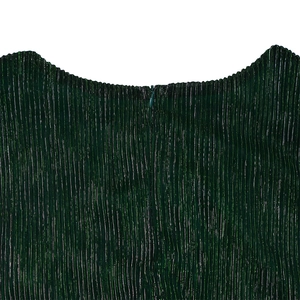 Detail view of dark green pleated fabric with metallic silver threads and invisible zipper