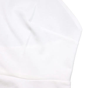 Detailed close-up showing the fine texture and high-quality stitching of the white fabric