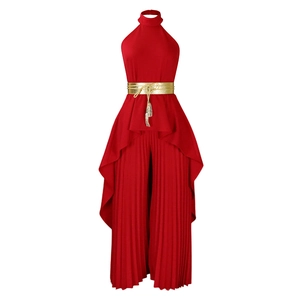 Detail of red pleated jumpsuit with golden woven belt and elegant fringe tassel detail