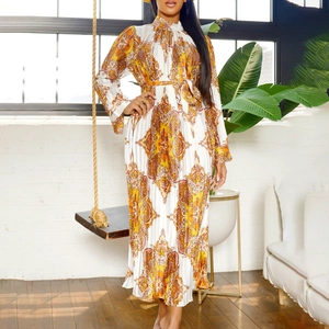 Detail of long sleeve pleated maxi dress with vintage paisley print and belted waist