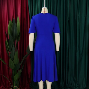Detail view of the royal blue puff sleeve dress with a back invisible zipper and slim waistline