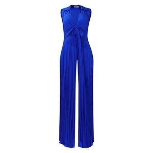 Detail of royal blue sleeveless jumpsuit featuring V-neckline with a bow and pleated wide legs