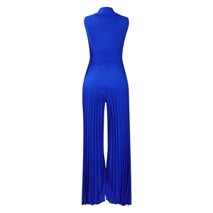 Rear view of electric blue pleated wide-leg jumpsuit showing vertical pleated fabric texture