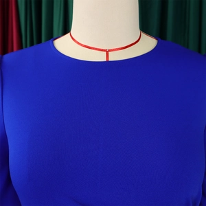 Close-up of royal blue round neck dress fabric texture and neckline detail