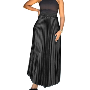 Detailed view of high waist black pleated maxi skirt with elegant satin finish texture