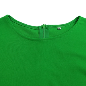 Detail of round neckline and invisible zipper on green chiffon short sleeve dress