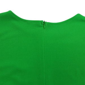 Detailed close-up of the high-quality invisible back zipper on the green summer dress