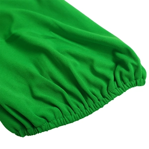 Detail shot of bright green lantern sleeve cuff with elastic pleats and woven texture