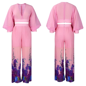 Detailed front and back views of pink chiffon v-neck lantern sleeve top and floral wide-leg pants