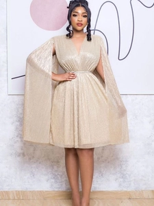 Elegant champagne gold V-neck cocktail dress with cape sleeves and sparkling belt