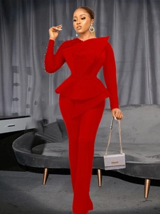 Women's red two-piece fashion set with ruffled long sleeve top and high waist trousers