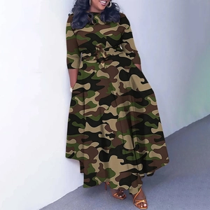 Detail of elegant jungle camo print dress with adjustable waist tie and long sleeves