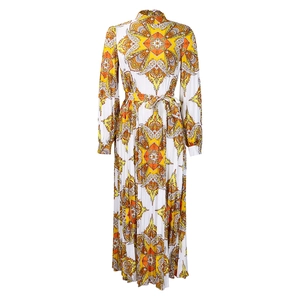Detailed view of bohemian mandala print and pleated texture on long sleeve dress
