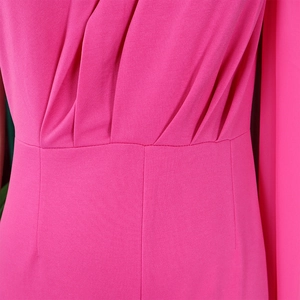 Detail view showing elegant waist pleats and fabric texture of the rose pink jumpsuit