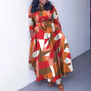 Detail view of colorful geometric print and waist tie on the A-line plus size dress