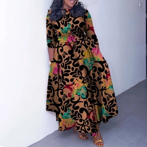 Detail view of ethnic floral print maxi dress with waist tie and long wide skirt