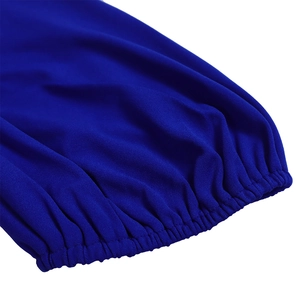Detailed close-up of elasticated puff sleeve cuffs on a royal blue dress with fine texture