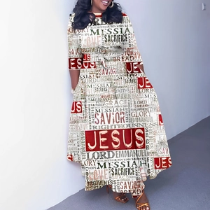 Macro detail of religious text print with JESUS and MESSIAH on an A-line maxi dress