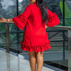 Detailed back view of a red dress featuring elegant tiered ruffle bell sleeves and hem