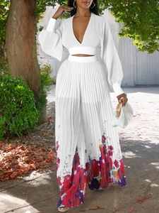 Elegant white two-piece chiffon set with V-neck pleated top and floral wide-leg pants