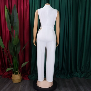 Rear view of white sleeveless jumpsuit featuring a chic gold chain detail on the waist