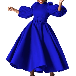 Detail of royal blue bubble sleeve dress with wide waist belt and flared skirt