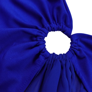 Detail of royal blue jumpsuit showing chic circular cutout with fine ruched stitching