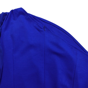 Detail view of the hidden side zipper on a royal blue elegant formal jumpsuit for women