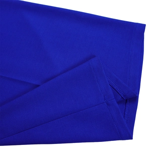 Detailed view of the overlock stitching and high-density knit fabric in electric blue