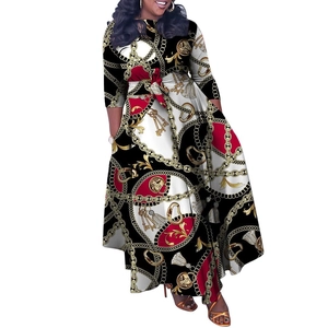 Detailed close-up of vibrant chain print fabric on elegant plus size maxi dress