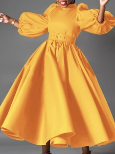 Bright yellow plus size puff sleeve midi dress with a decorative wide waist belt