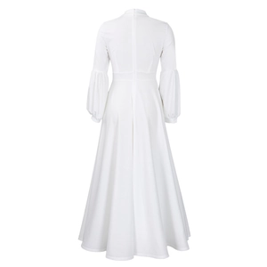Detail view of the back showing a high collar and invisible zipper on the white maxi dress