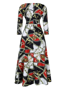 Detail view of the back of a maxi dress featuring a chain print and hidden zipper design