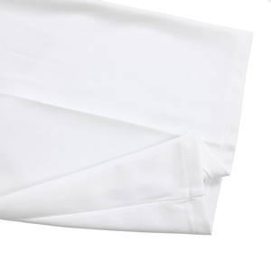 Close-up of white high-density knitted fabric with professional double-stitched hem finish