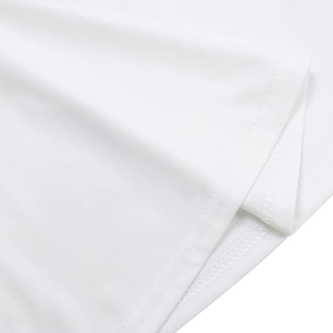 Macro view of white knit fabric texture and high-quality double-needle hemming details