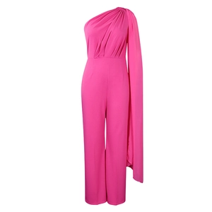 Detailed close-up of hot pink one-shoulder jumpsuit with elegant pleated cape and wide legs