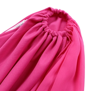 Macro detail of elastic pleated cuff on elegant rose red chiffon dress fabric