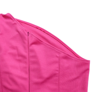 Close-up of rose pink fabric showing knit texture and invisible zipper detail