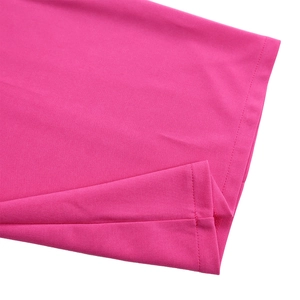 Macro shot of hot pink knit fabric showing detailed double-needle hem stitching finish