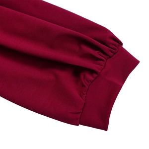 Close-up of wine red puff sleeve cuffs with high-density elastic ribbed knit details