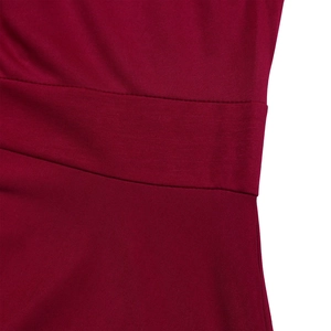 Close-up of wine red knit dress showing fine horizontal texture and neat double-stitching