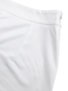 Close-up of high-waist cut with invisible side zipper and precise topstitching detail