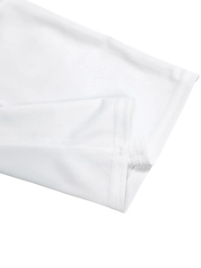 Detail shot of white knitted fabric showing high-quality double-needle hem stitching